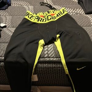 Nike Kids Black and Yellow Pro Combat Bottoms ( ski or Hockey)